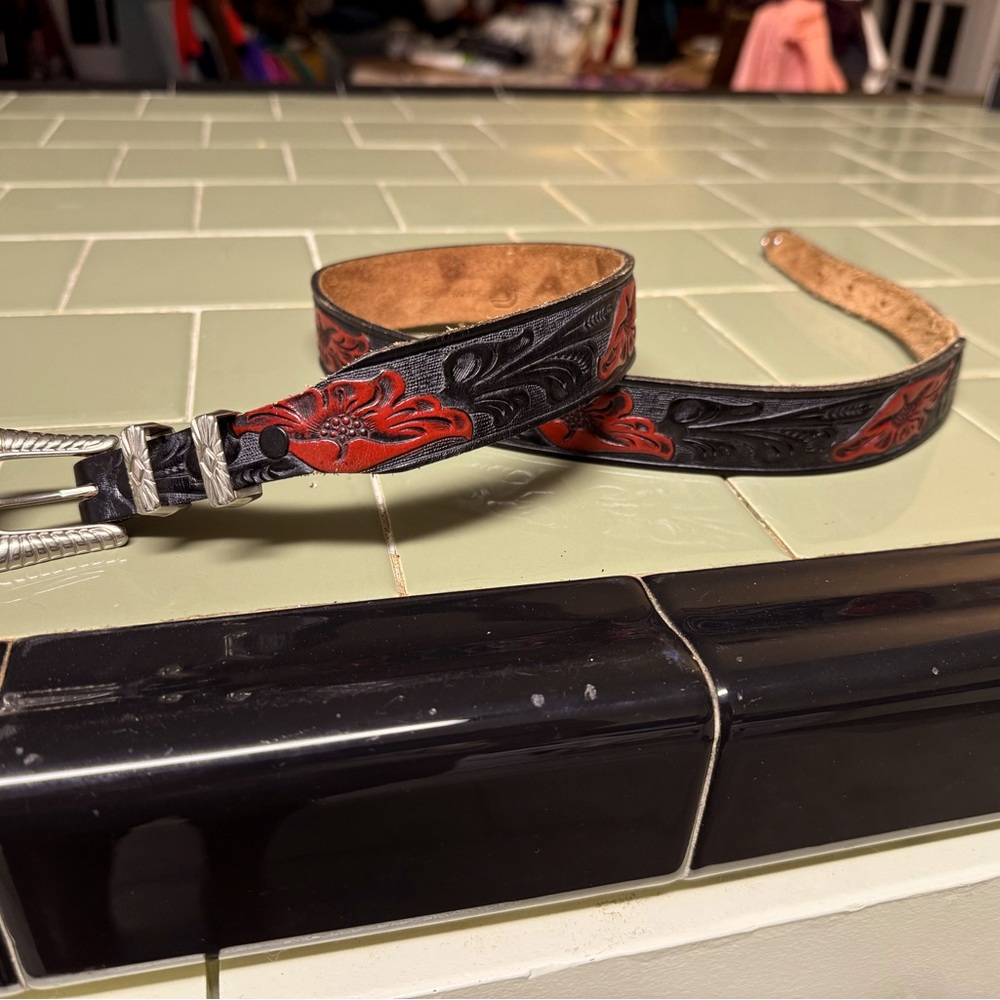 Genuine leather stamped belt with belt buckle